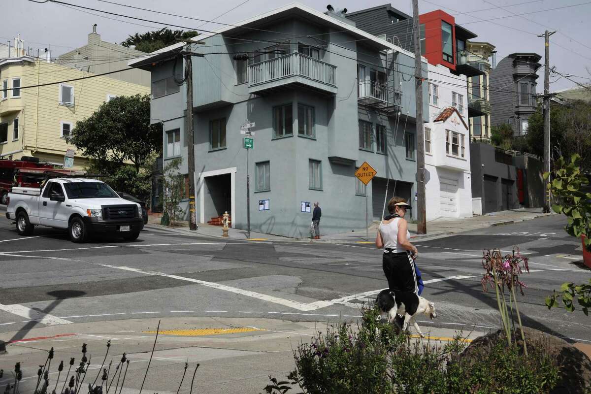 A view of Scott Pluta and his wife Rosalind Pluta's property (center) in the 4000th block of 17th St. on Wednesday, August 25, 2021, in San Francisco, Calif.