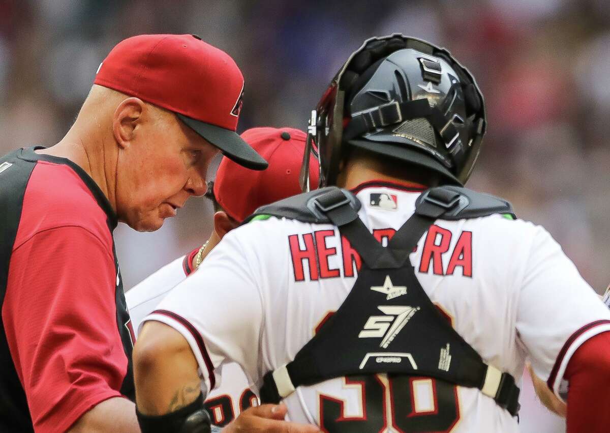 After leaving the Astros following last year’s World Series, pitching coach Brent Strom, left, was lured by the Diamondbacks, whose ballpark in Phoenix is roughly 100 miles from his Tucson home.