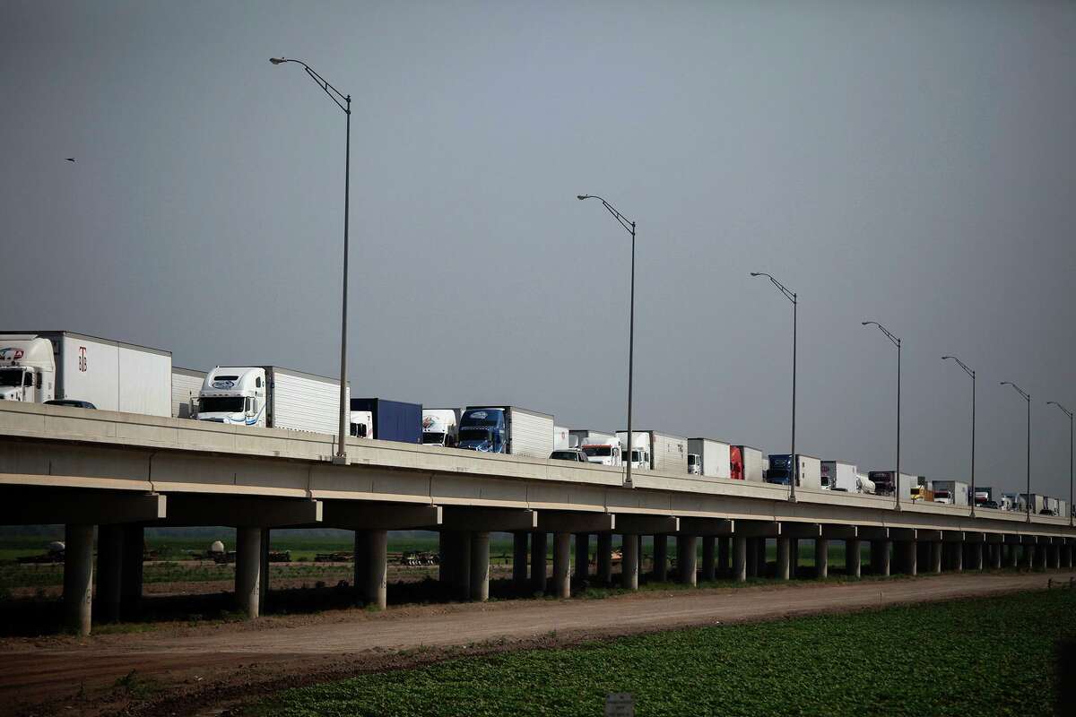 biz - Trucks wait on the Pharr-Reynosa International Bridge to enter the United States and for their trucks and loads to be inspected by Customs and Border Protection Agriculture Specialists at the Pharr-Reynosa International Bridge Port of Entry on Monday, April 18, 2011. LISA KRANTZ/lkrantz@express-news.net