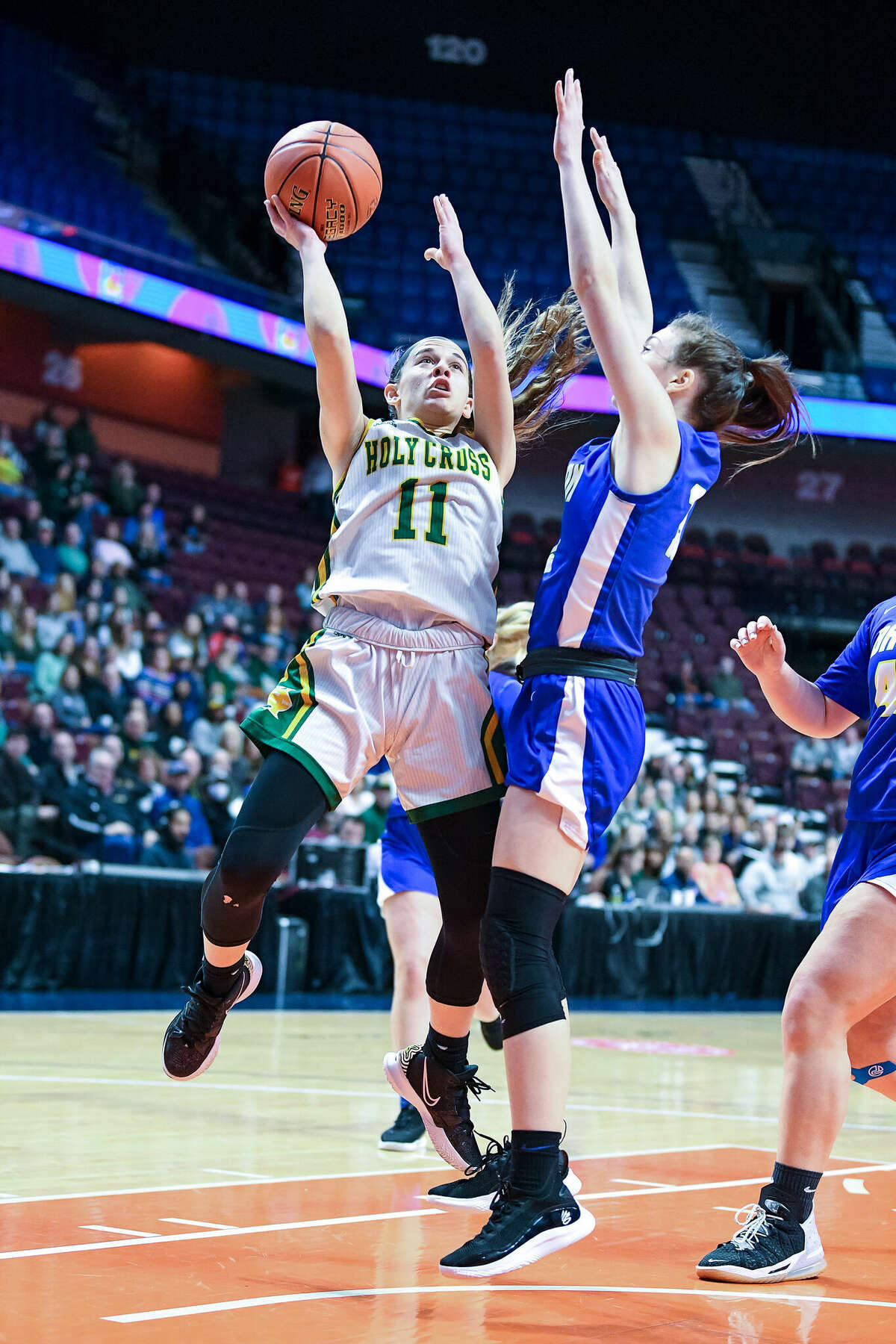 Holy Cross high's Mya Zaccagnini during the CIAC Class M Girls final against Bacon Academy at Mohegan Sun Arena, Sunday, March 20, 2022.