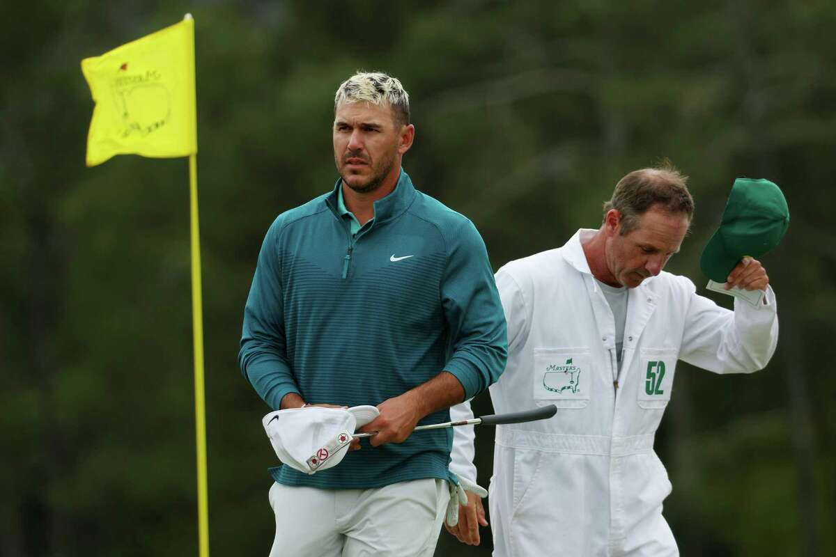 AUGUSTA, GEORGIA - APRIL 08: Brooks Koepka walks off the 18th green after finishing his round during the second round of The Masters at Augusta National Golf Club on April 08, 2022 in Augusta, Georgia. Koepka has committed to play in June’s Travelers Championship. (Photo by Andrew Redington/Getty Images)