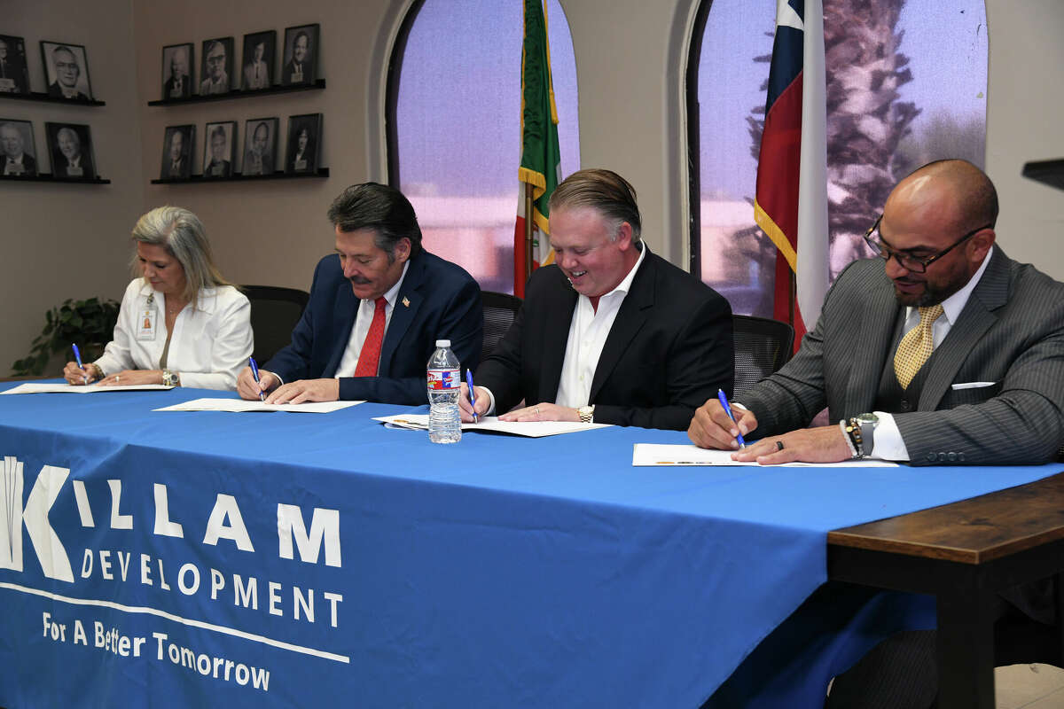 The Coves TIRZ invovled entities gathered to sign the 30 year agreement at the Laredo Economic Development Corporation building. Laredo College dean Dr. Diana Ortiz, Laredo Mayor Pete Saenz, Cliffe Killam and Webb County Judge Tano Tijerina signed the agreement.