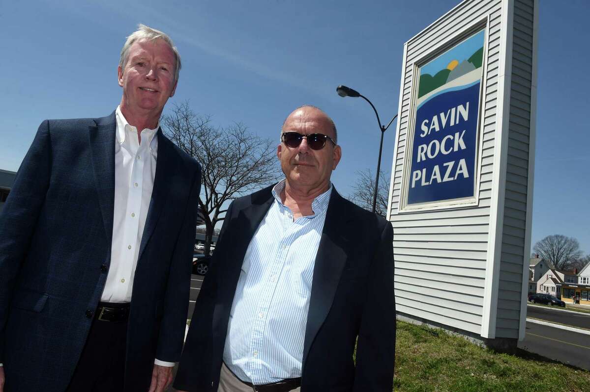 DeLaurentis Management managing partners Jim Coleman, left, and Ed DeLaurentis are photographed at Savin Rock Plaza in West Haven on April 13, 2022.