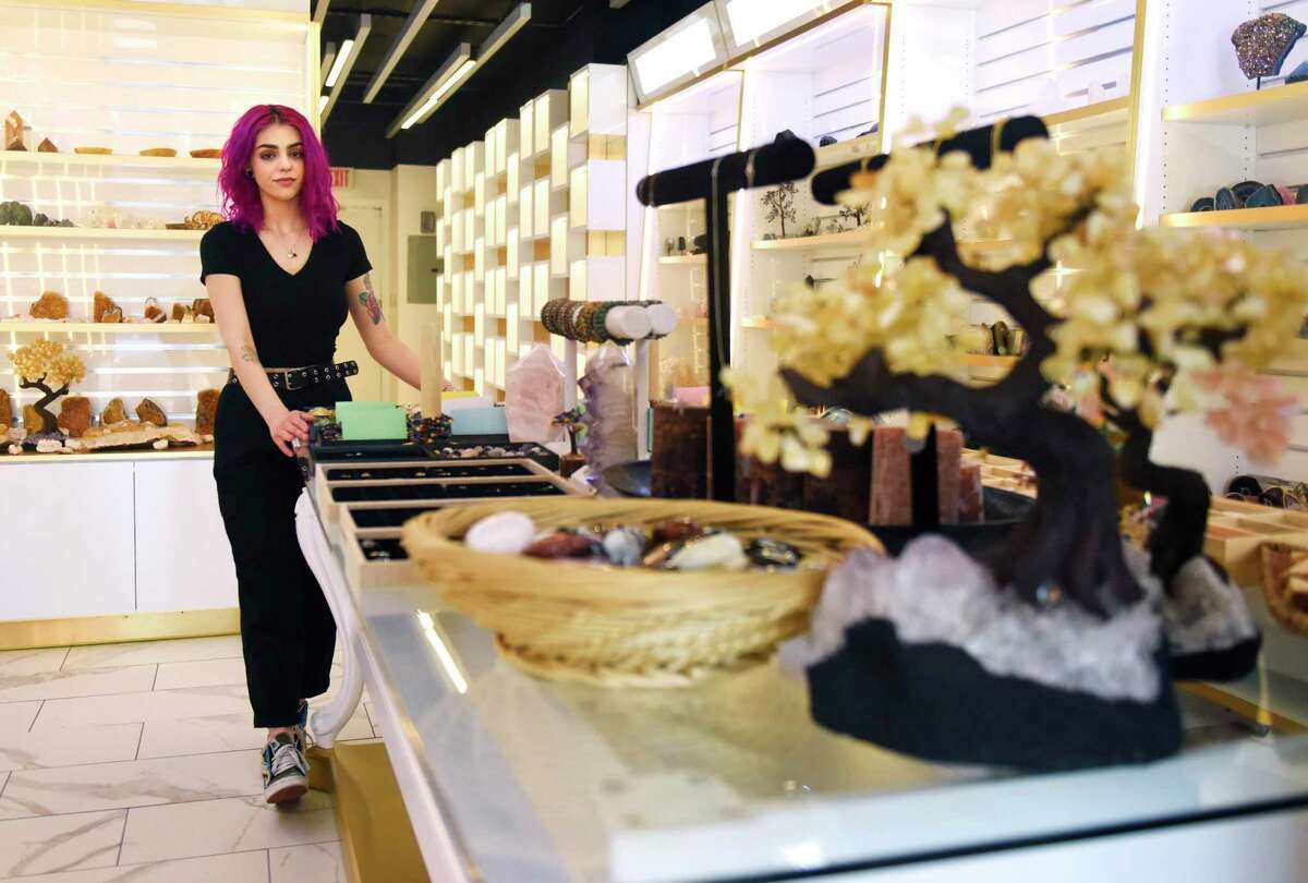 Co-founder Starr Rybnick shows a collection of crystals at the new Crystals Unlimited shop in Stamford on Wednesday. Located at 854 High Ridge Road, the store opened its doors April 8 featuring a variety of raw and tumbled crystal specimens, jewelry, geodes, agates, sculptures, and more.