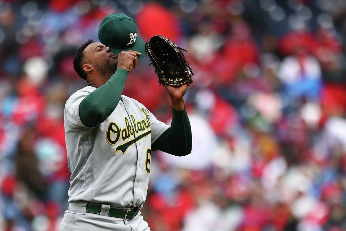 PHILADELPHIA, PA - APRIL 10: Domingo Acevedo #68 of the Oakland Athletics gestures after getting the final out in the seventh inning against the Philadelphia Phillies during a game at Citizens Bank Park on April 10, 2022 in Philadelphia, Pennsylvania. The As defeated the Phillies 4-1. (Photo by Rich Schultz/Getty Images)