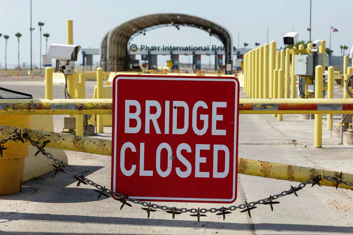 Barriers block the entrance to the Pharr-Reynosa International Bridge on April 13, 2022 in Pharr, Texas. Mexican truckers have suspended traffic since at least April 9, 2022 at the bridge in protest of Texas Governor Abbotts new inspection mandate.