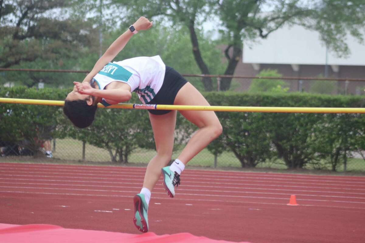 Memorial's  Julixa Cintron competes in the high jump Wednesday where she claimed the district title, defeating seven other competitors.