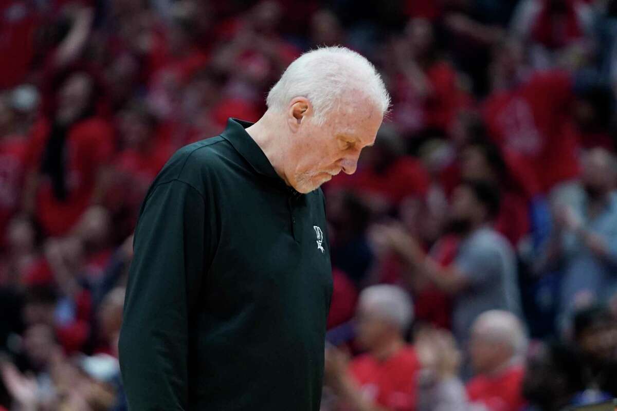 Spurs coach Gregg Popovich walks on the court during a timeout in the first half of an NBA play-in game against the Pelicans in New Orleans, Wednesday on April 13, 2022.