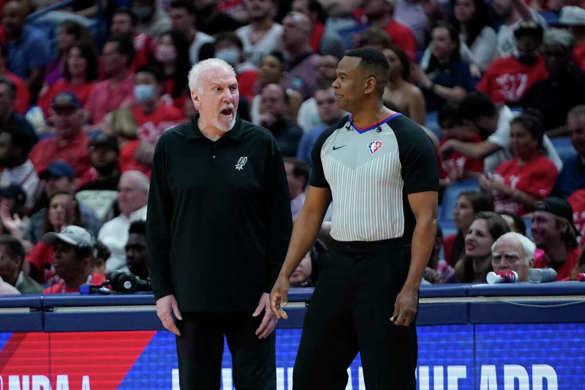 Spurs coach Gregg Popovich challenges a referee in the first half of an NBA play-in game in New Orleans on Wednesday, April 13, 2022.