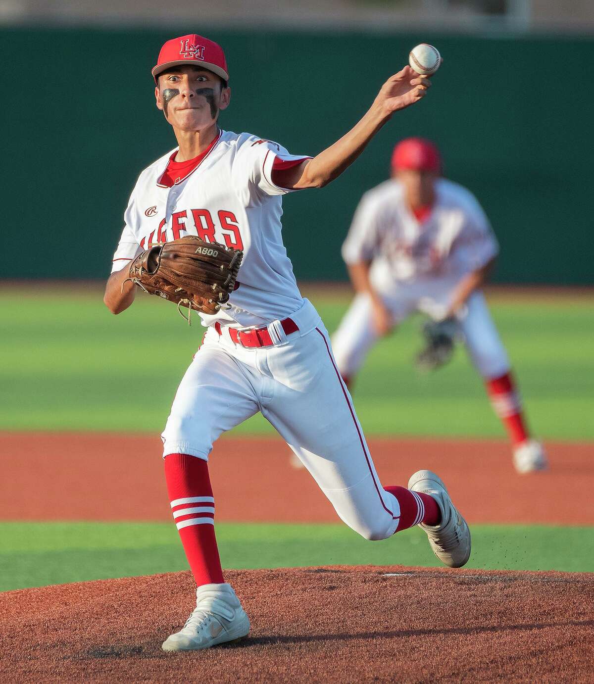 Martin High School’s Azael Perez pitches during a game against Veterans Memorial High School, Tuesday, April 12, 2022 at Veterans Field. Perez tossed a shutout in the Tigers’ win over Rio Grande City on Tuesday.