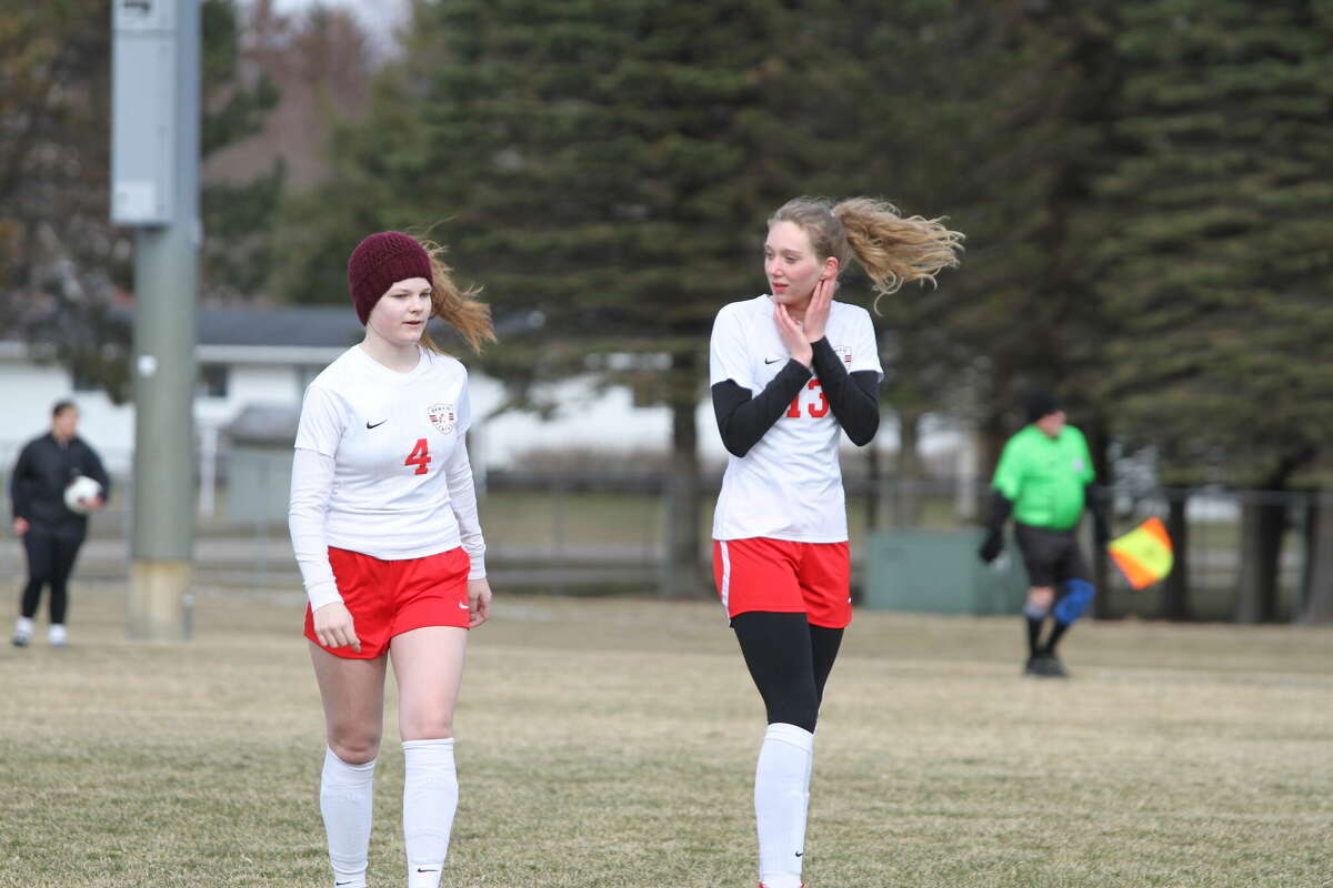 Benzie Central's Kadence Pouper (left) and Montana Baron (right) prepare to face Manistee on April 8. 