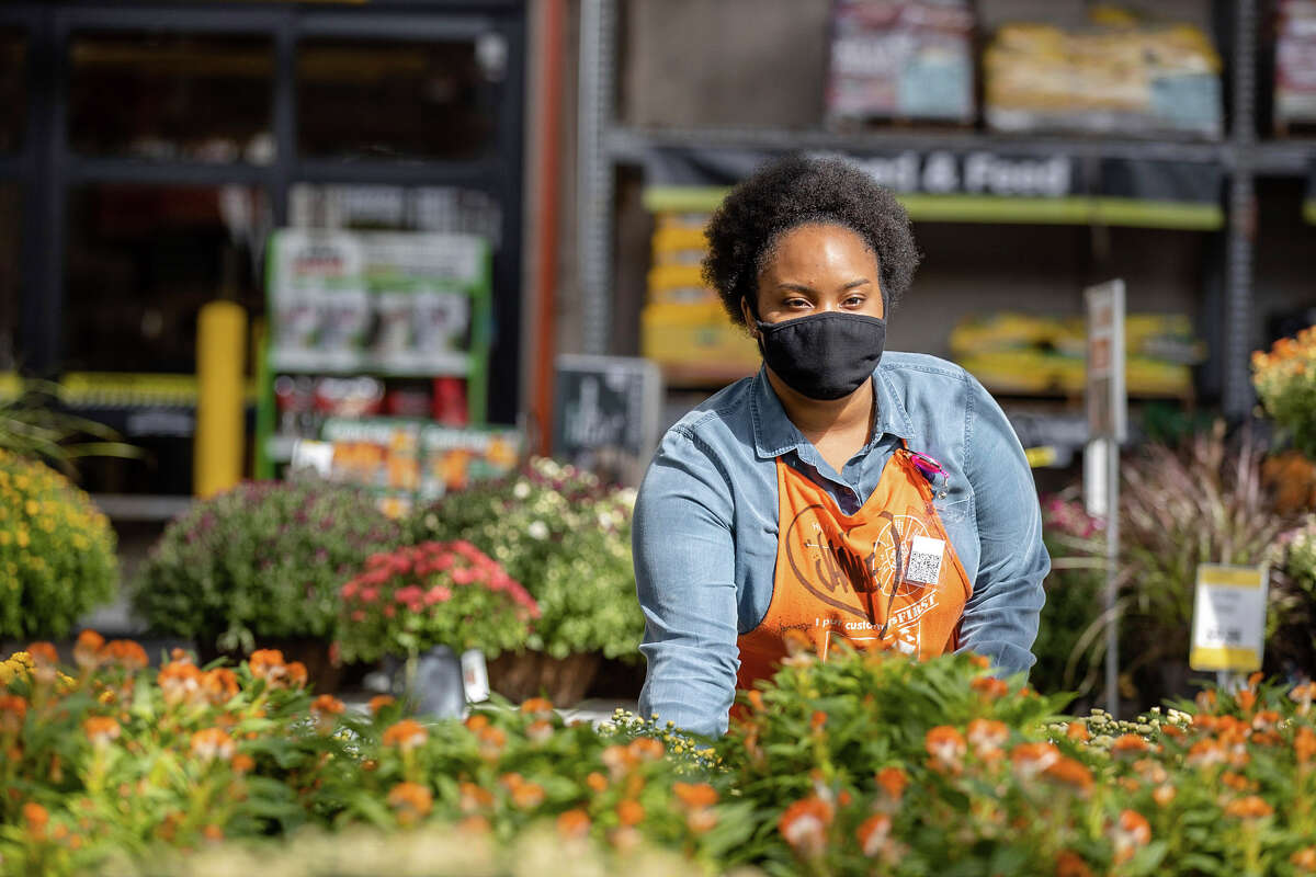Employees at Home Depot stores. The home improvement retail chain said it is looking to hire over 300 employees for tis busy spring 2022 season.