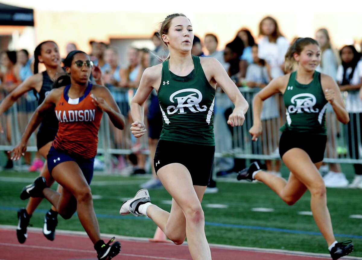 Reagan’s Hunter Simmons winning the girls 100-meter dash as the District 28-6A track finals on Wednesday, April 13, 2022 at Heroes Stadium.