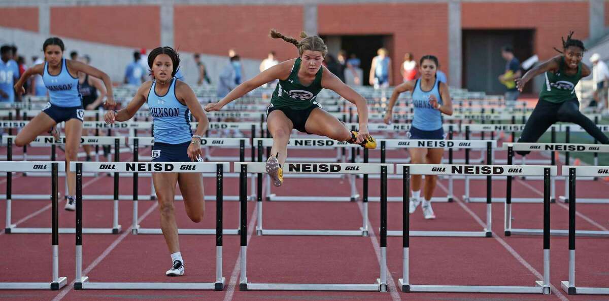 Reagan’s Isabella Dagrosa wins the girls 110-meter hurdles at the district 28-6A track finals on Wednesday, April 13, 2022 at Heroes Stadium.