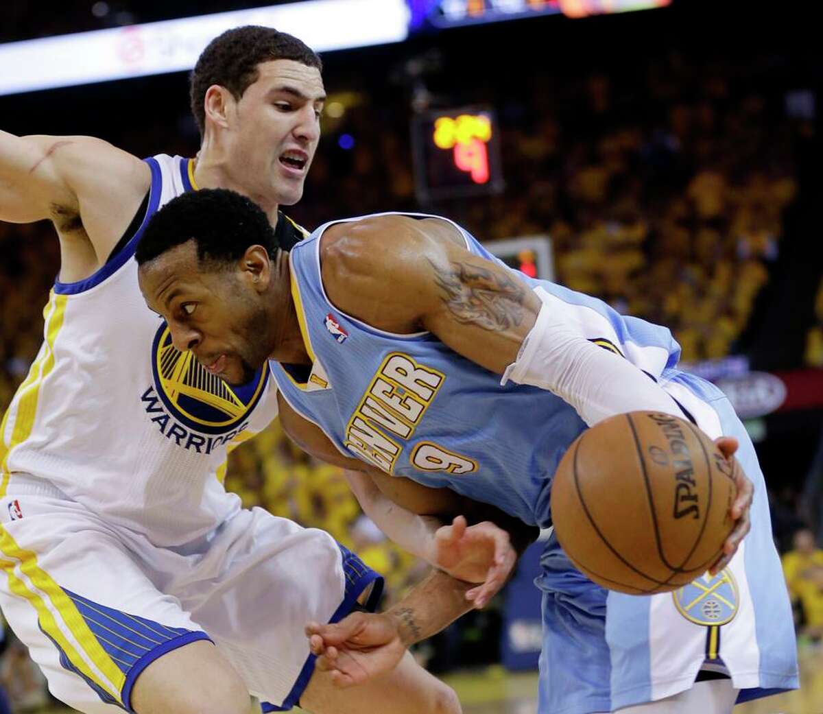 Denver’s Andre Iguodala drives on Klay Thompson during the 2013 playoffs. Within weeks they would be teammates.