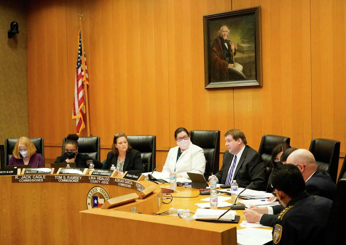 Members of the Harris County Bail Bond Board are shown in meeting Wednesday, April 13, 2022, in Houston. The board voted on a proposal to set minimum 10 percent fee on bail bonds.