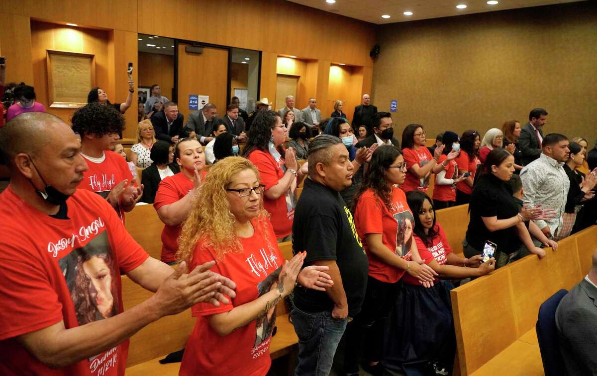 Tito Moczygemba, left, and Anna Machado, parents of Diamond Alvarez, 16, who died after being shot 22 times, were among several victims families in the capacity crowd to attend the Harris County Bail Bond Board meeting Wednesday, April 13, 2022, in Houston. The board voted on a proposal to set minimum 10 percent fee on bail bonds.