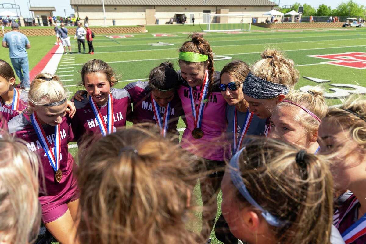 Magnolia head coach April Cleveland speaks to her team after falling 3-0 to Frisco Wakeland during a Class 5A girls soccer semifinal in Georgetown, Thursday, Apr., 14, 2022.