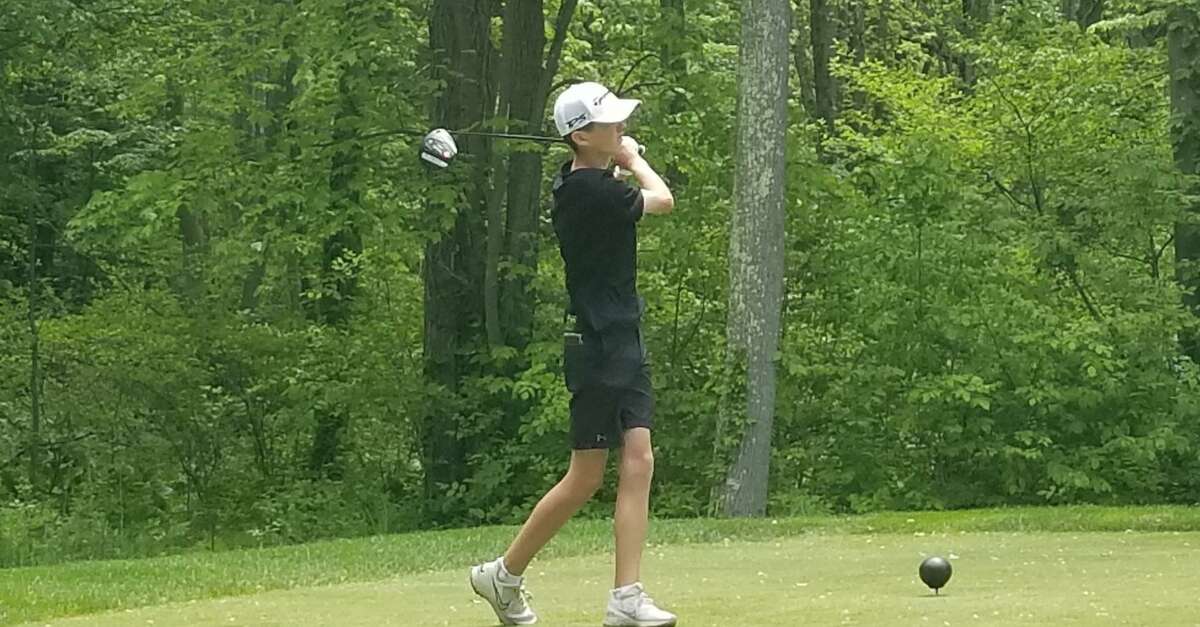 Cam St. Pierre of Shelton tees off at the 2021 SCC championship meet at Race Brook Country Club in Orange.