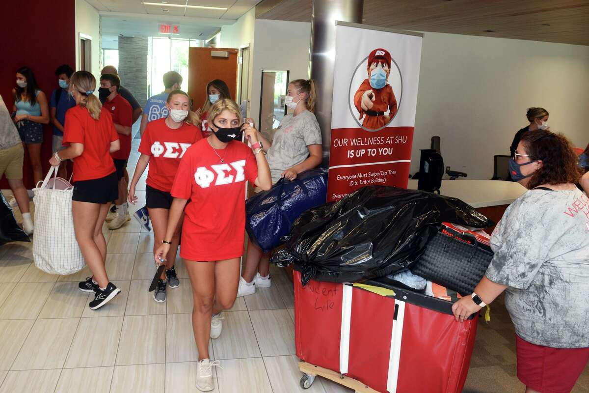 Move in day for first year students on the campus of Sacred Heart University, in Fairfield, Conn. Aug. 26, 2021.