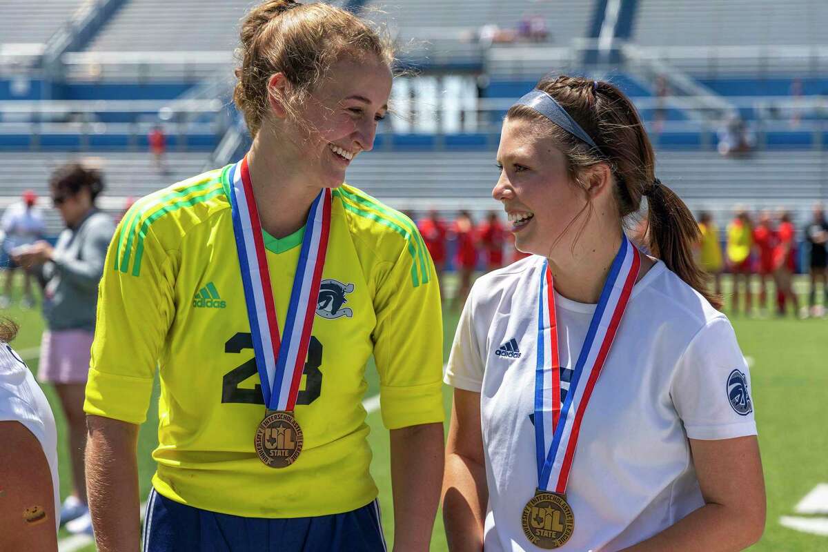 Boerne Champion keeper Audrey Riordan, left, and midfielder Lorenna Garza stand with their bronze medals after falling to Grapevine 6-3 during a Class 5A girls soccer semifinal in Georgetown, Thursday, Apr., 14, 2022.