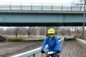 Neither sleet, rain nor gloom can halt this bike ride