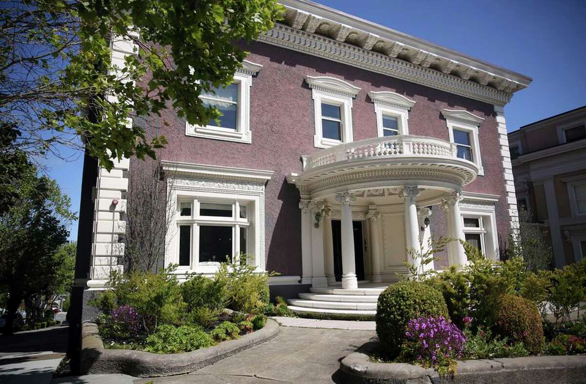 The historic mansion’s classical exterior contrasts with the interior’s many rooms each featuring unique modern design motifs.