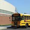 A school bus turns into GHS on the first day of the 2017-2018 school year at Greenwich High School in Greenwich on Aug. 31, 2017.
