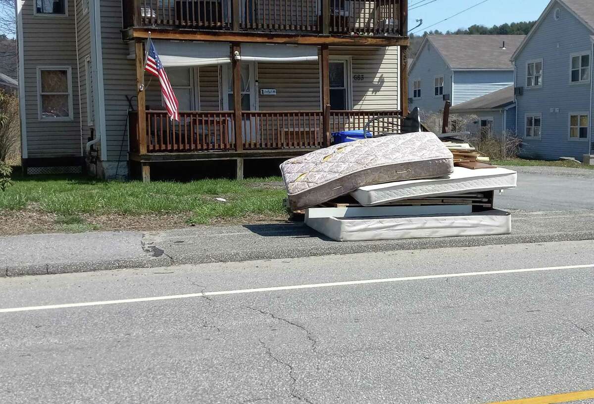 Torrington recently changed its management system for bulky waste, including furniture, mattresses and other items. Instead of just leaving it on the curb, residents must now apply for a permit and make an appointment to have their waste picked up. Pictured are piles of bulk waste around town, seen Wednesday afternoon.