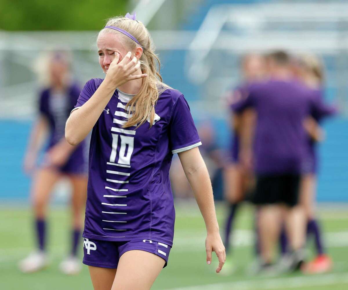 Fort Bend Ridge Point defender Devon Rountree (10) wipes away tears after losing to Rockwall 4-2 in double overtime of a Class 6A girls state semifinal match during the UIL State Soccer Championships, Friday, April 15, 2022, in Georgetown.