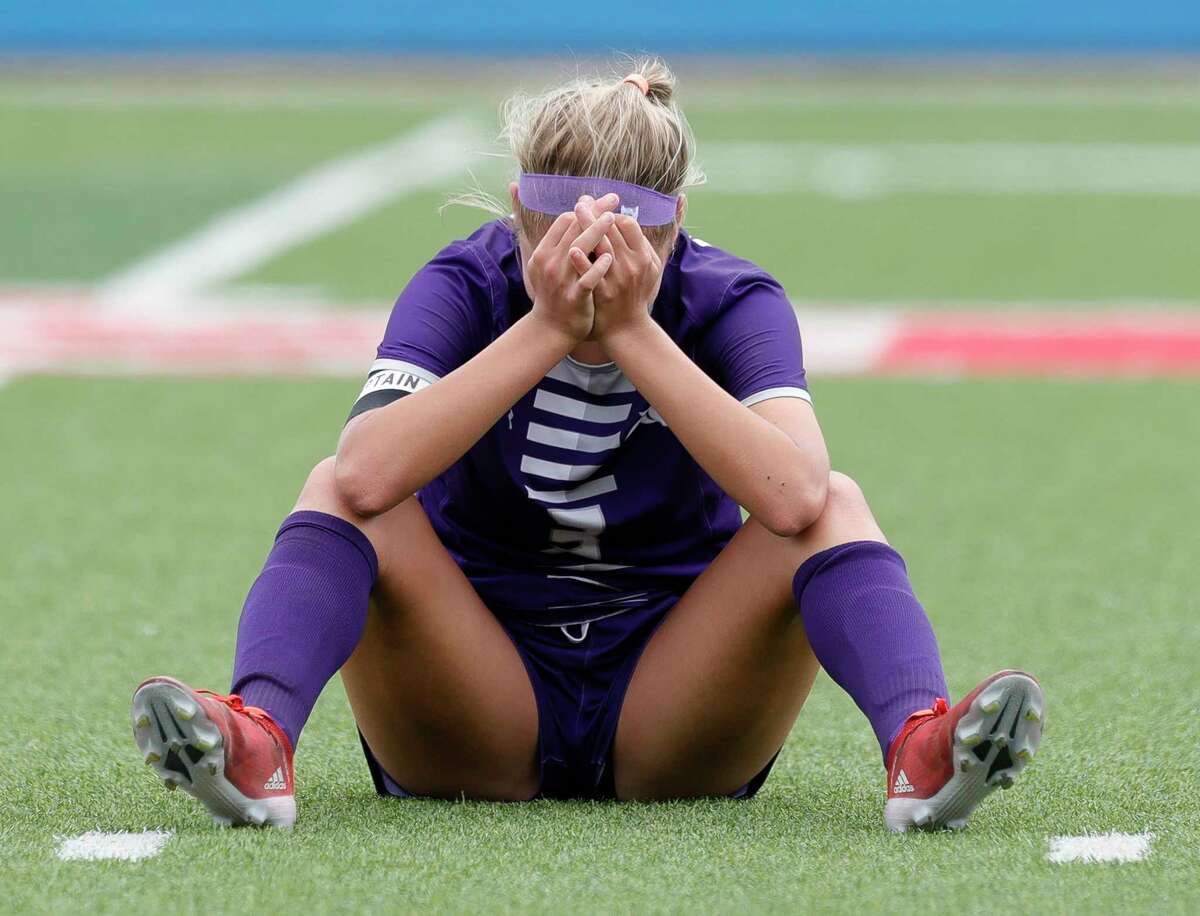 A Ridge Point player reacts after losing to Rockwall 4-2 in double overtime of a Class 6A girls state semifinal match during the UIL State Soccer Championships, Friday, April 15, 2022, in Georgetown.