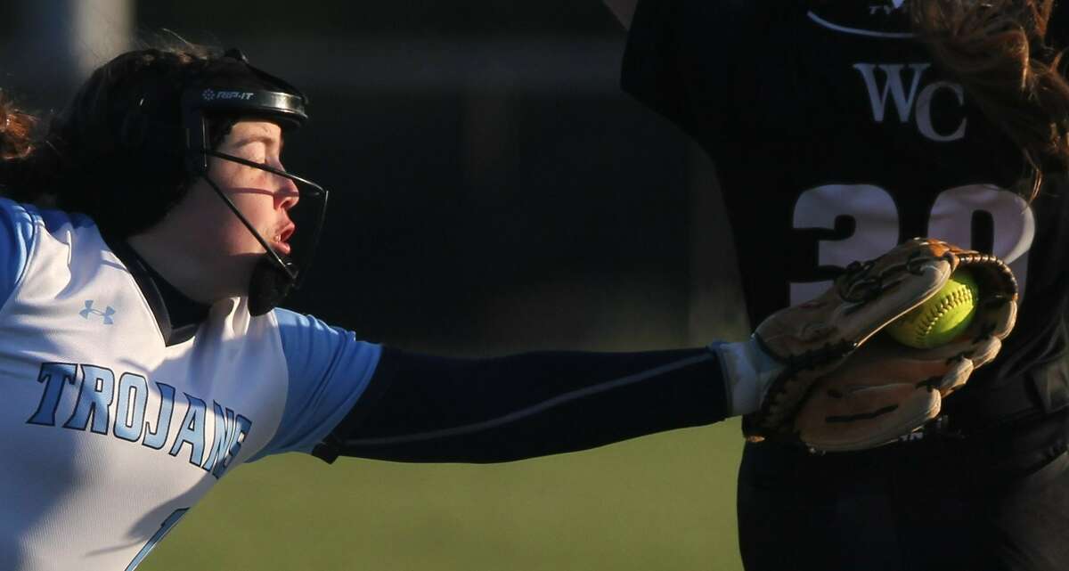 Action from the West Central softball team's win over Triopia at Future Champions in Jacksonville on Thursday
