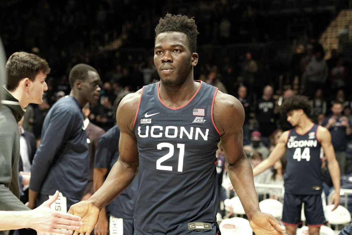INDIANAPOLIS, INDIANA - JANUARY 20: Adama Sanogo #21 of the Connecticut Huskies is introduced before a college basketball game against the Butler Bulldogs at Hinkle Arena on January 20, 2022 in Indianapolis, Indiana. (Photo by Mitchell Layton/Getty Images)