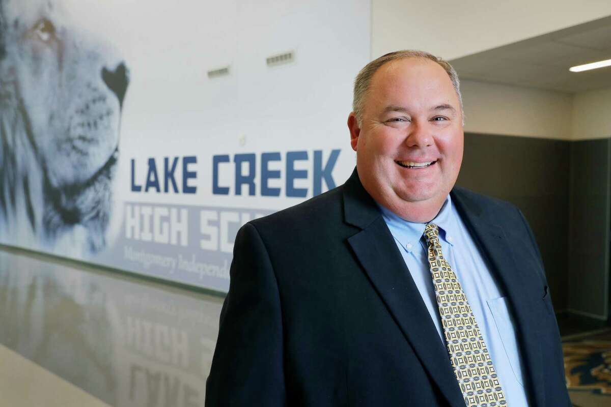 Newly named Lake Creek High School principal Tim Williams at the school’s main entrance hallway Thursday, April 14, 2022 in Montogmery, TX. Williams replaces long time principal Phil Eaton who is retiring this year.