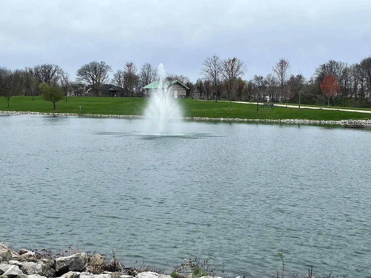 The fountain and lake at Joe Glik Park in Edwardsville on Friday.
