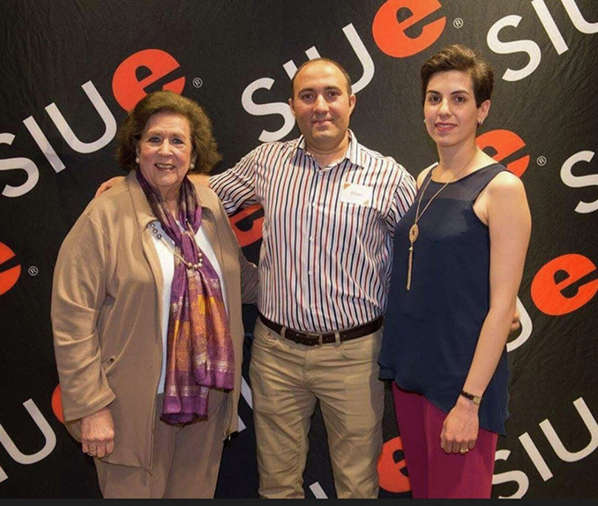 International Hospitality Program host Joyce Schrader of Edwardsville, left, with SIUE students Ehsan and Kimia from Iran.