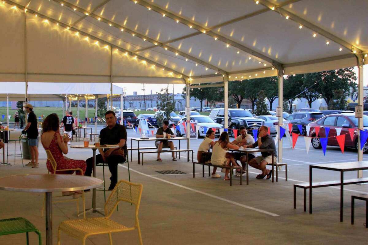 Buffalo Bayou Brewing Co. erected two large tents in its parking lot, providing additional outdoor dining space at the popular venue in Sawyer Yards.