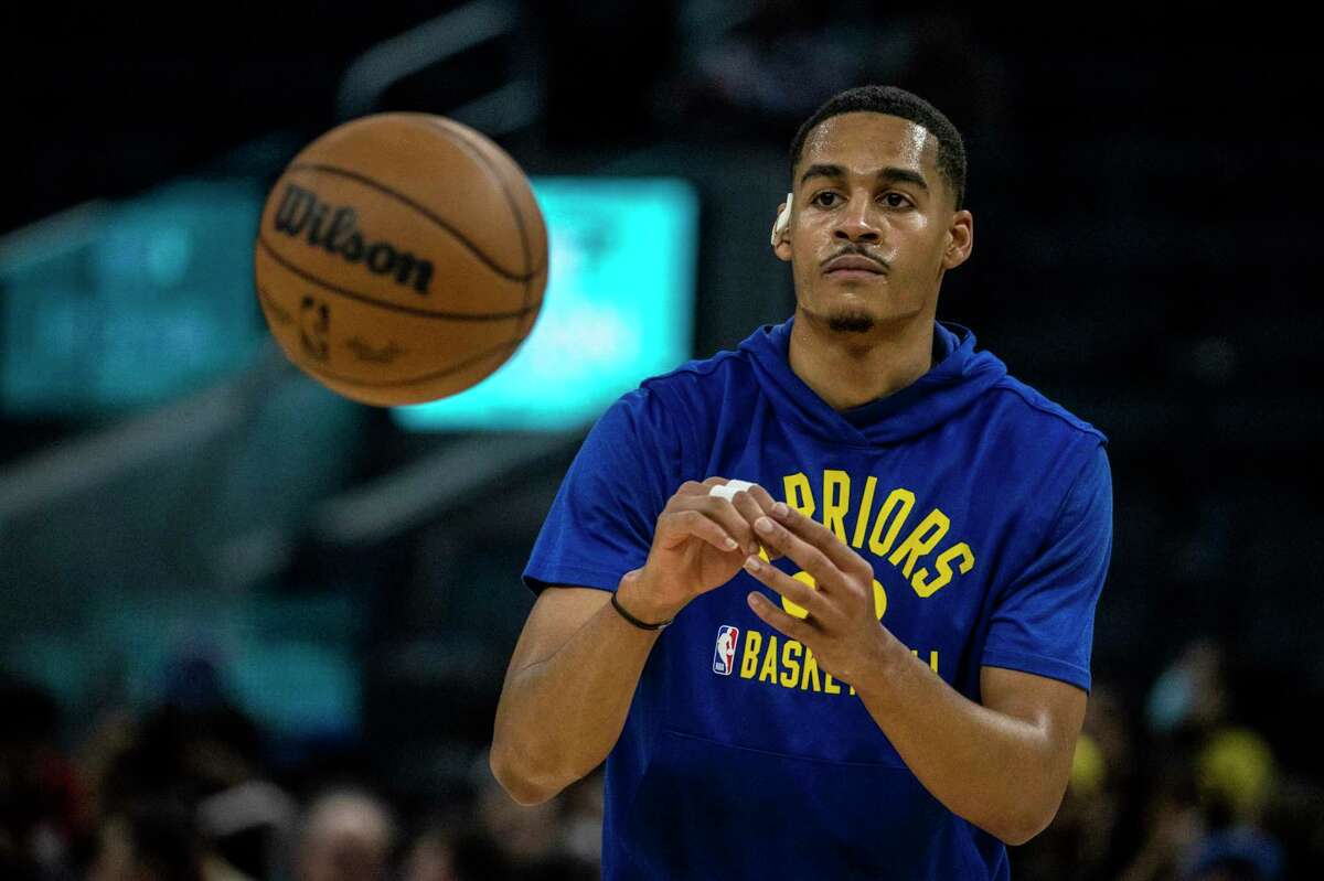 Golden State Warriors guard Jordan Poole warms up before his NBA basketball game against Los Angeles Lakers in San Francisco, Calif. Thursday, April 7, 2022.