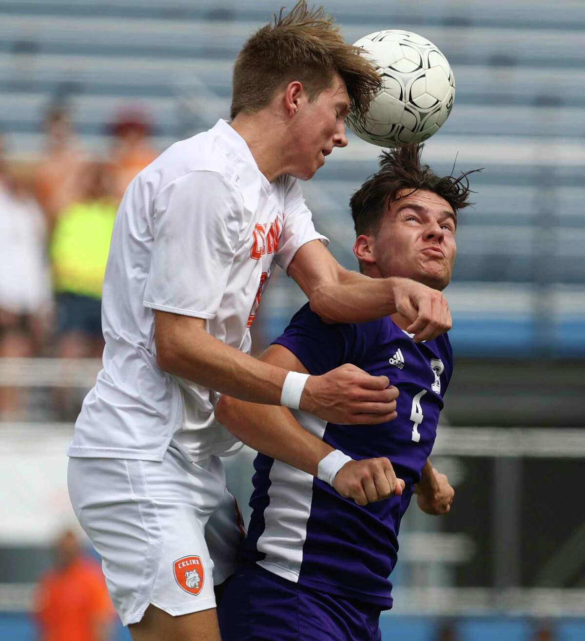 Boerne Greyhounds' Landon Murphy (04) contends for a header against Celina Bobcats' Kohyn Gough (10) in the Class 4A soccer state championship game in Georgetown on Friday, Apr. 15, 2022. Boerne defeated Celina, 2-1, in overtime to win their second and back-to-back state title.