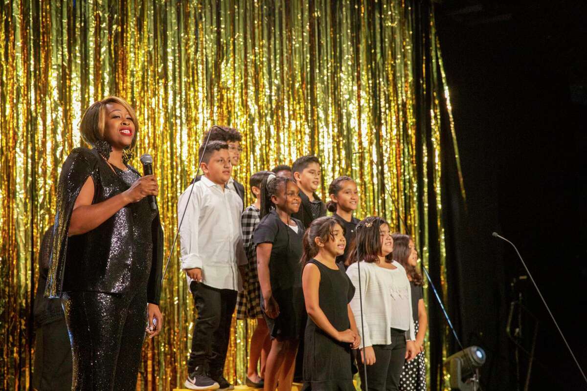 Boys & Girls Clubs members perform at an event.