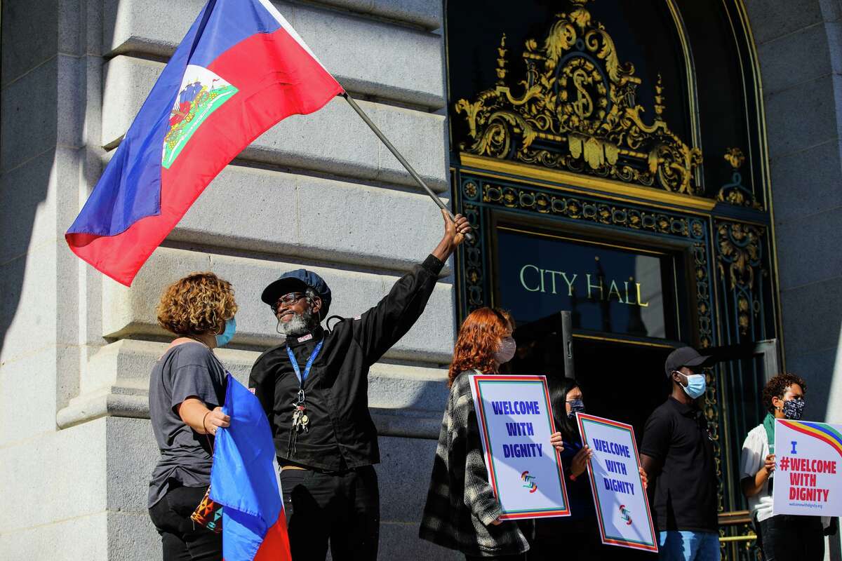 Demonstrators rally at S.F. City Hall last year to demand that the Biden administration welcome Haitians seeking safety.