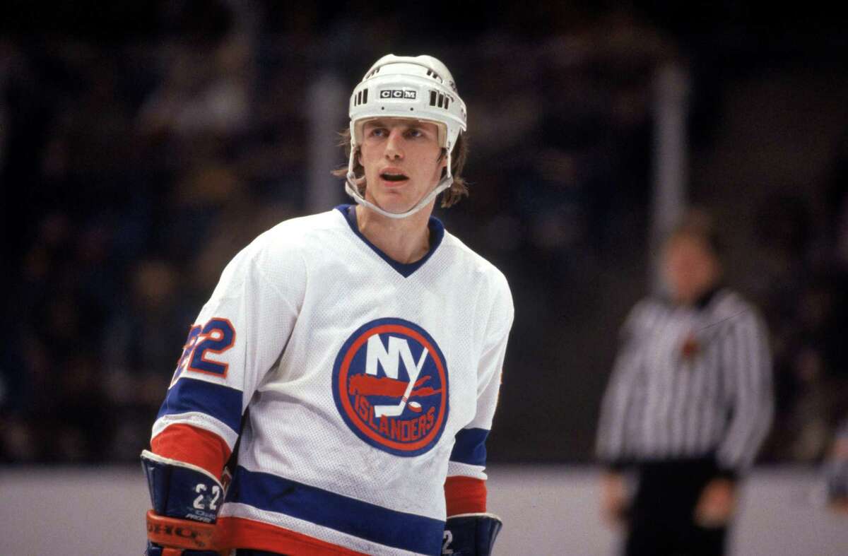 UNIONDALE, NY - 1984: Mike Bossy #22 of the New York Islanders skates during a game in 1984 at Nassau Veterans Memorial Coliseum in Uniondale, New York. Mike Bossy played for the Islanders from 1977 -1987. (Photo by Bruce Bennett Studios via Getty Images Studios/Getty Images)