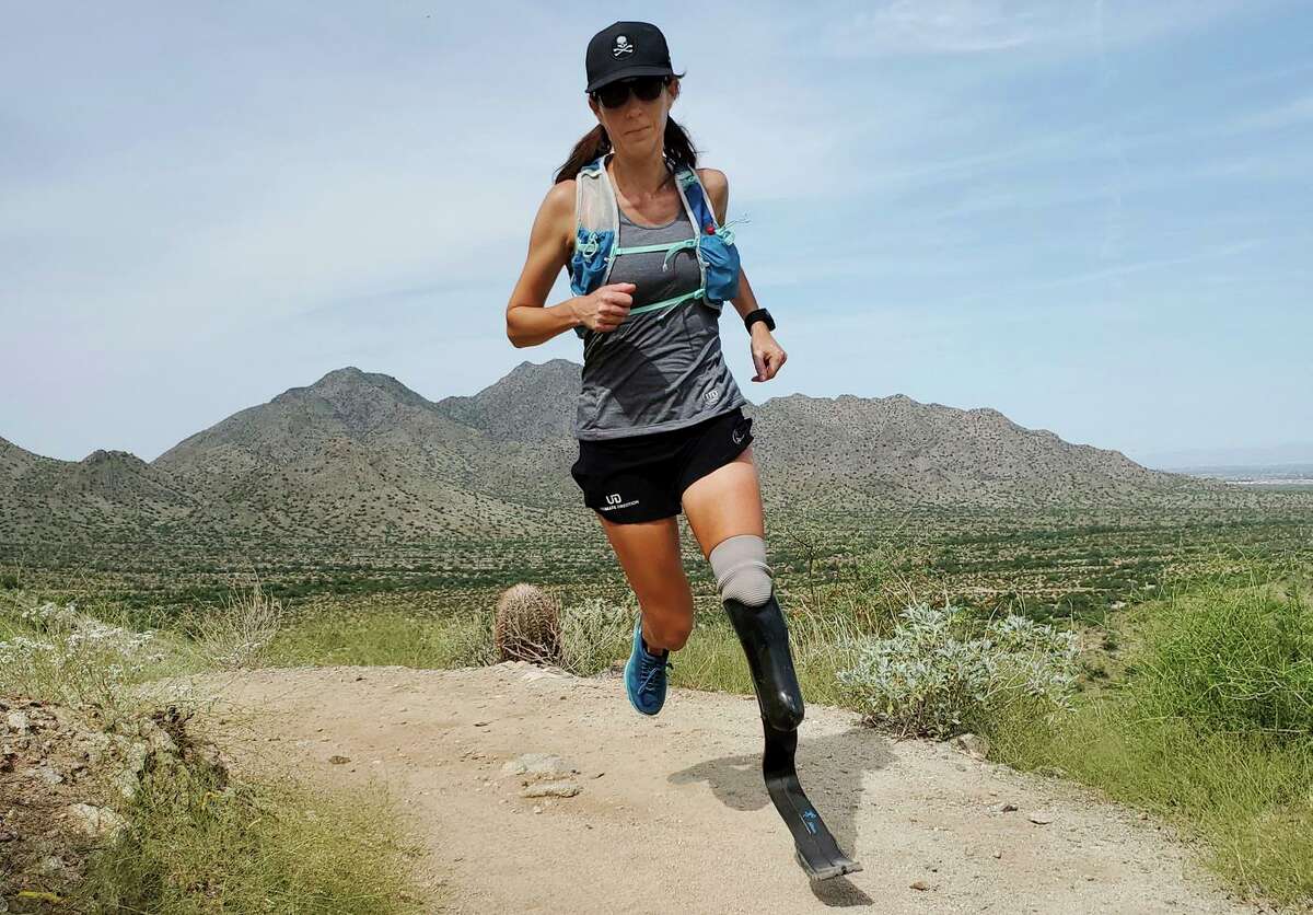Runner Jacky Hunt-Broersma of Gilbert, Ariz., who lost her left leg below the knee to a rare form of cancer, is aiming to run at least 102 marathons in 102 days and is almost there.