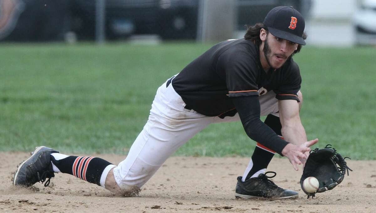 Beardstown second baseman Owen Quigley makes a game-saving play against Illini West Friday in Beardstown.