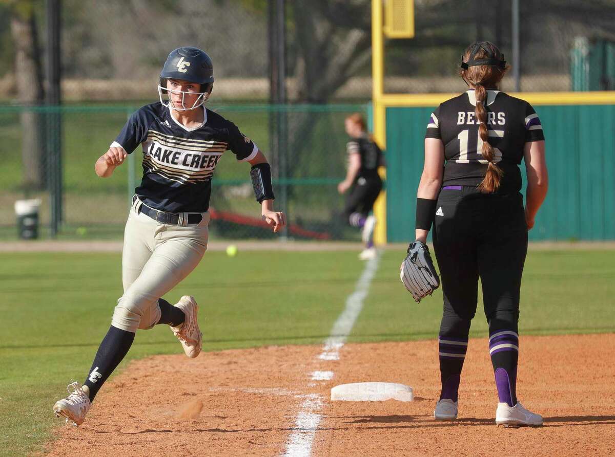Caelee Clark #4 of Lake Creek round third to score in the fourth inning of a District 20-5A high school softball game, Tuesday, March 15, 2022, in Montgomery.