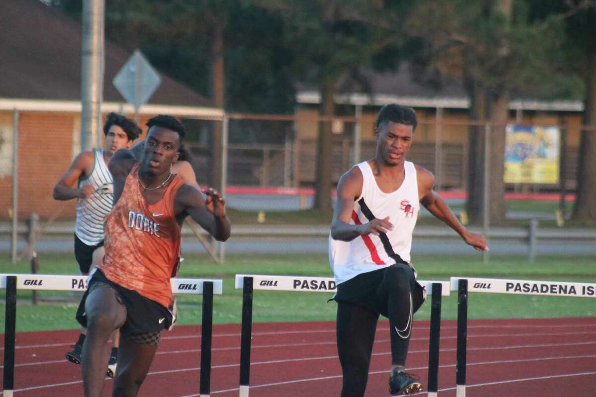 Dobie and South Houston 300-meter hurdlers begin the home stretch to the finish line Thursday night. They now prepare to take on District 21-6A opponents at the Area meet.