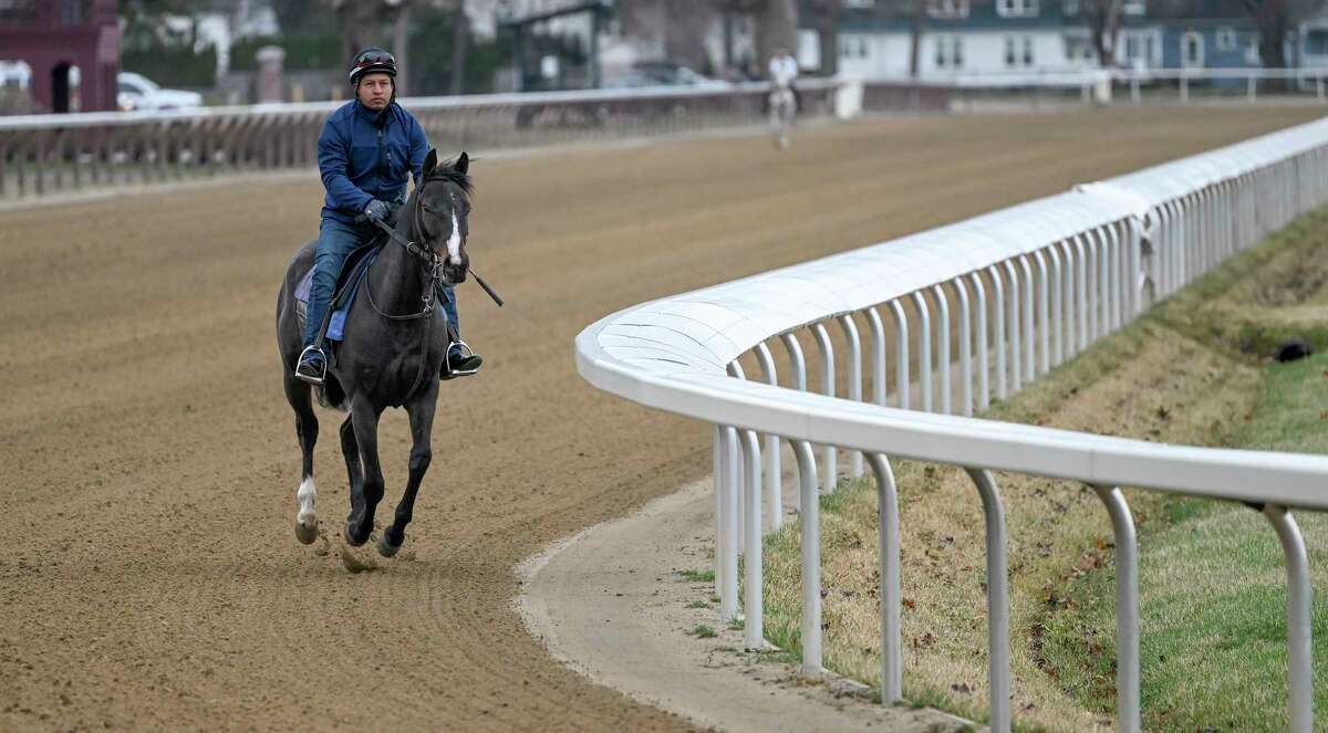 Exercise rider Jorge Castro guides Napoleon Complex around the track for the first time this season as the Oklahoma Training Center opened for training Saturday, April 17, 2022, in Saratoga Springs, N.Y. 