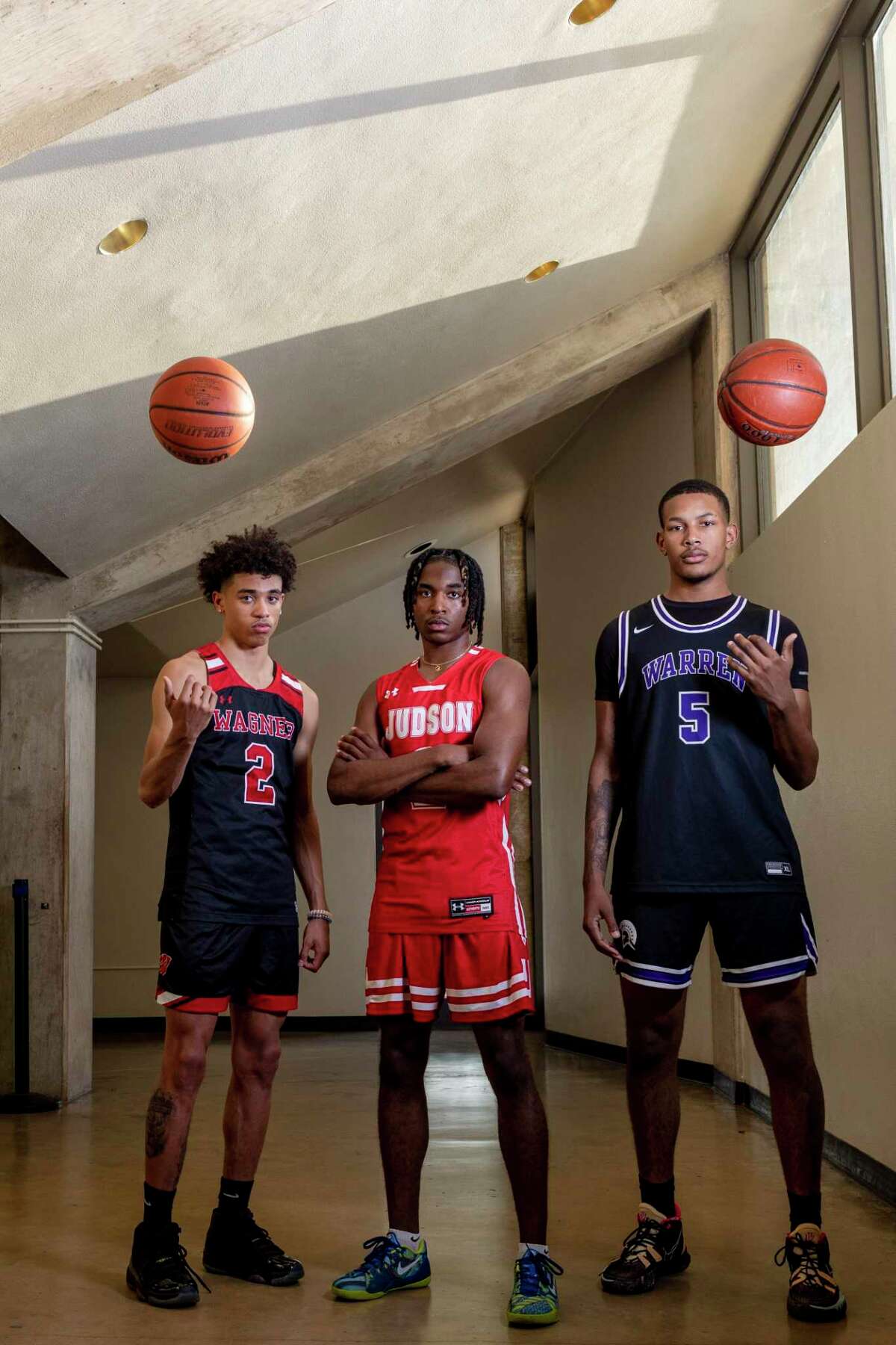 Player of the Year finalists (from left) Wagner’s Austin Nunez, Warren's Jaylen Crocker-Johnson and Judson’s Anariss Brandon are pictured at Paul Taylor Field House in San Antonio, Texas, on April 12, 2022.