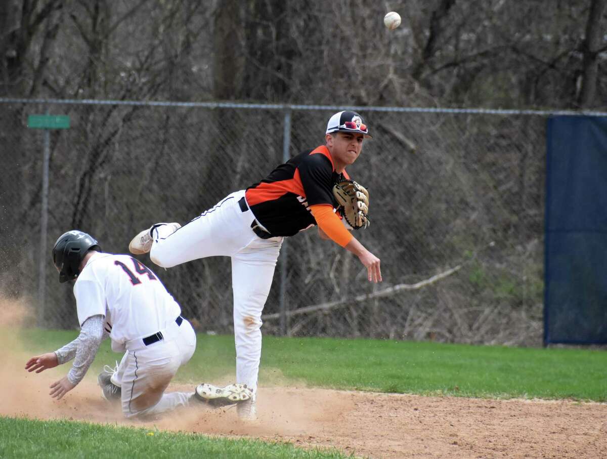Shelton's Gael Quiroga throws to first during a baseball game between Shelton and Lyman Hall at Pat Wall Field, Wallingford on Saturday, April 16, 2022.