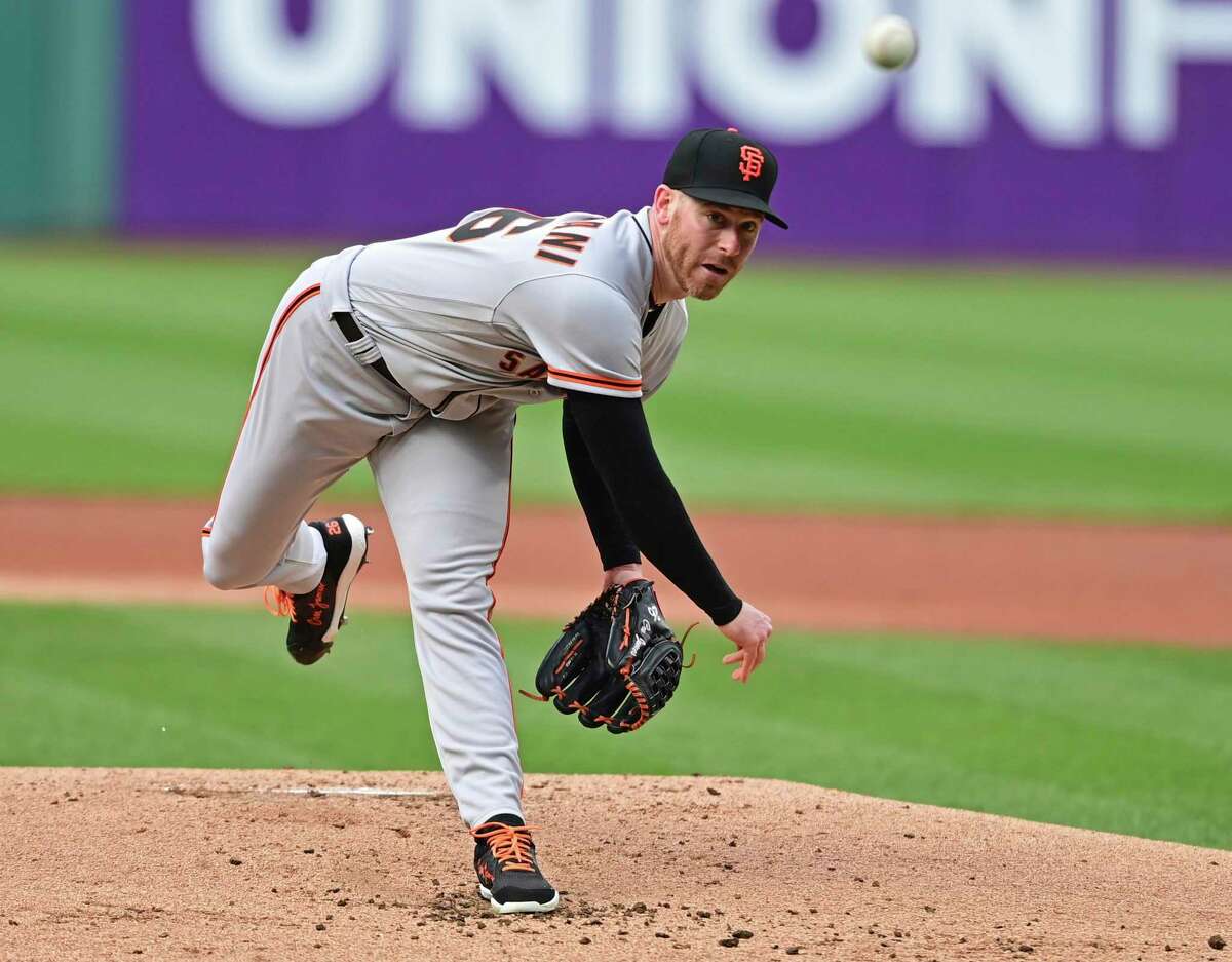 San Francisco Giants starting pitcher Anthony DeSclafani delivers in the first inning of a baseball game against the Cleveland Guardians, Saturday, April 16, 2022, in Cleveland. (AP Photo/David Dermer)